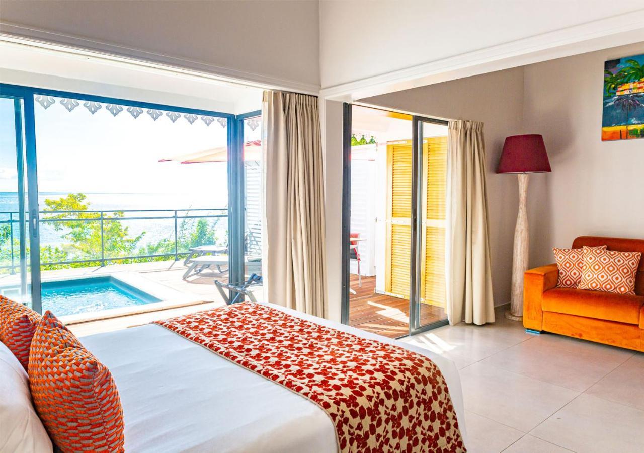 Les Galets Rouges Lodges & Spa Bouillante Exterior photo